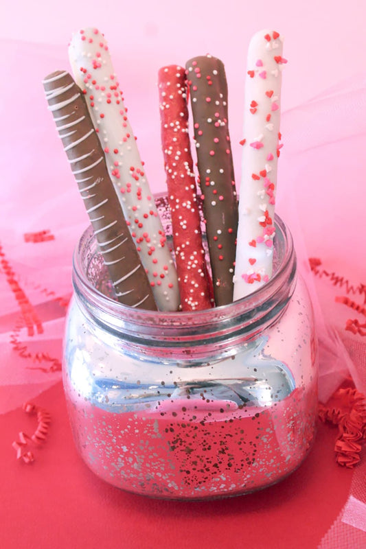Valentine’s Theme Chocolate Covered Pretzel Rods – 1 Dozen – Pretzel Rods Come Packaged as a Valentine’s Gift